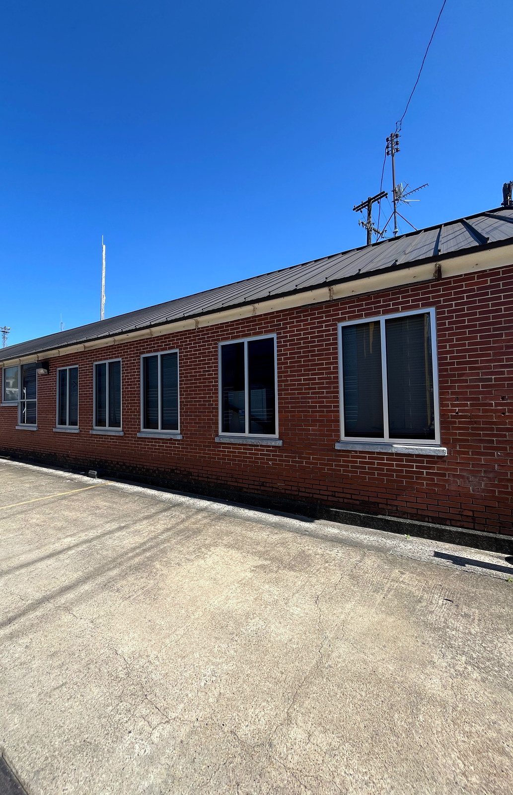 Replaced windows on a brick commercial building in Irondale, AL